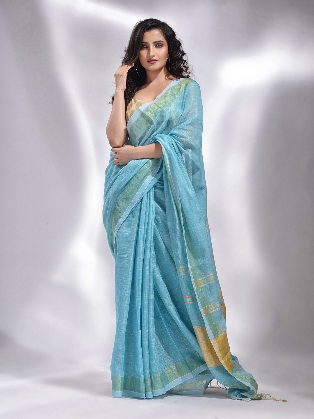 

Charukriti Blue & Cream-Coloured Zari Pure Cotton Saree