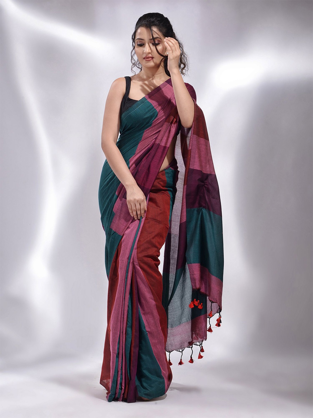 

Charukriti Teal & Purple Colourblocked Pure Cotton Saree