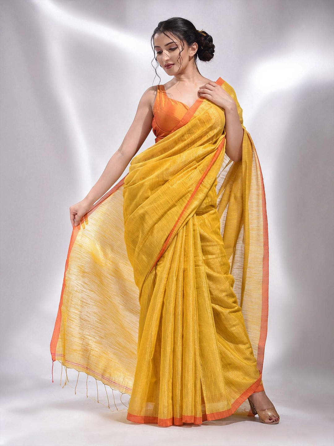 

Charukriti Yellow Woven Design Tissue Saree
