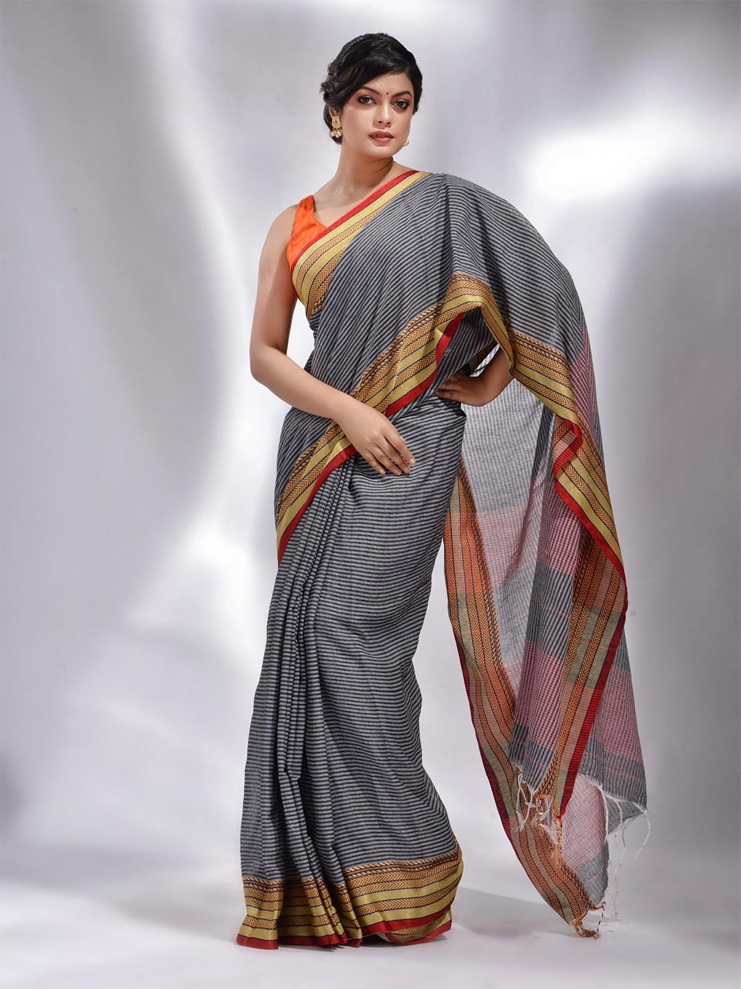 

Charukriti Grey & Pink Striped Zari Pure Cotton Saree