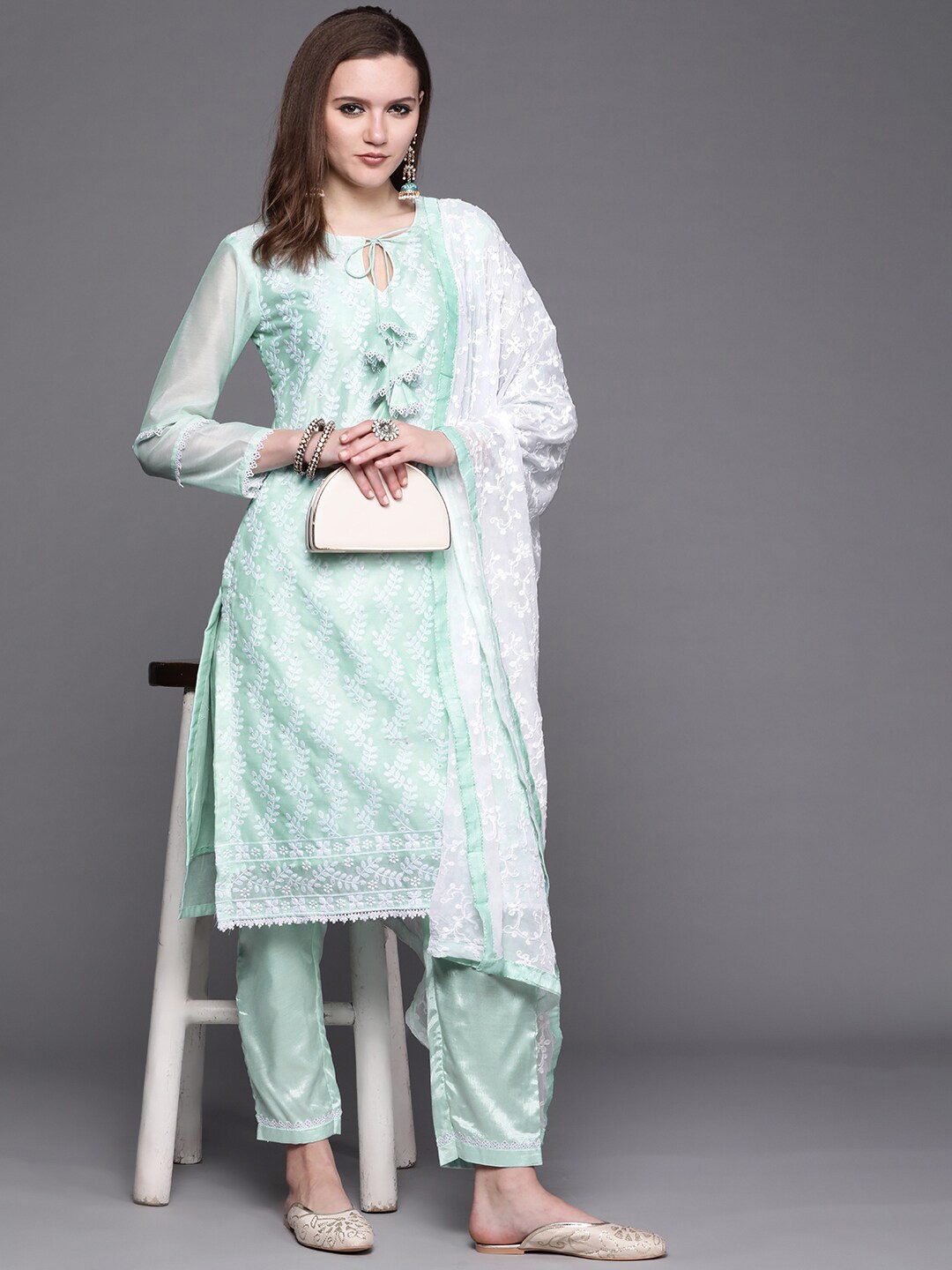 

Chhabra 555 Women Turquoise Blue Dress Material