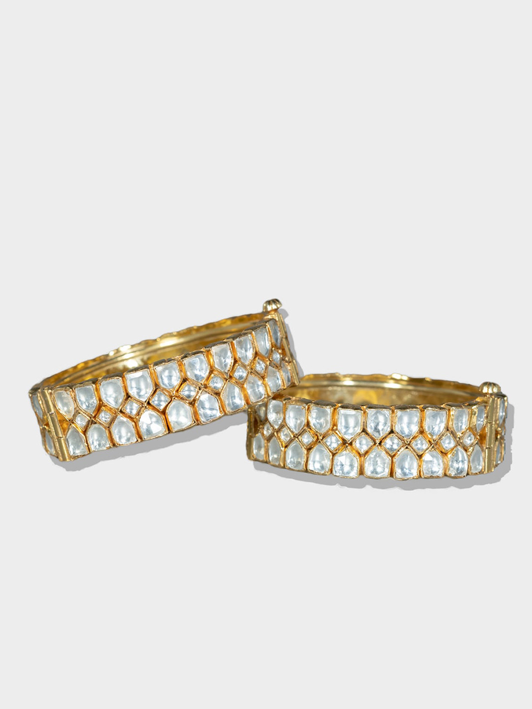 

AURAA TRENDS Set Of 2 22 KT Gold-Plated White Kundan-Studded Bangles