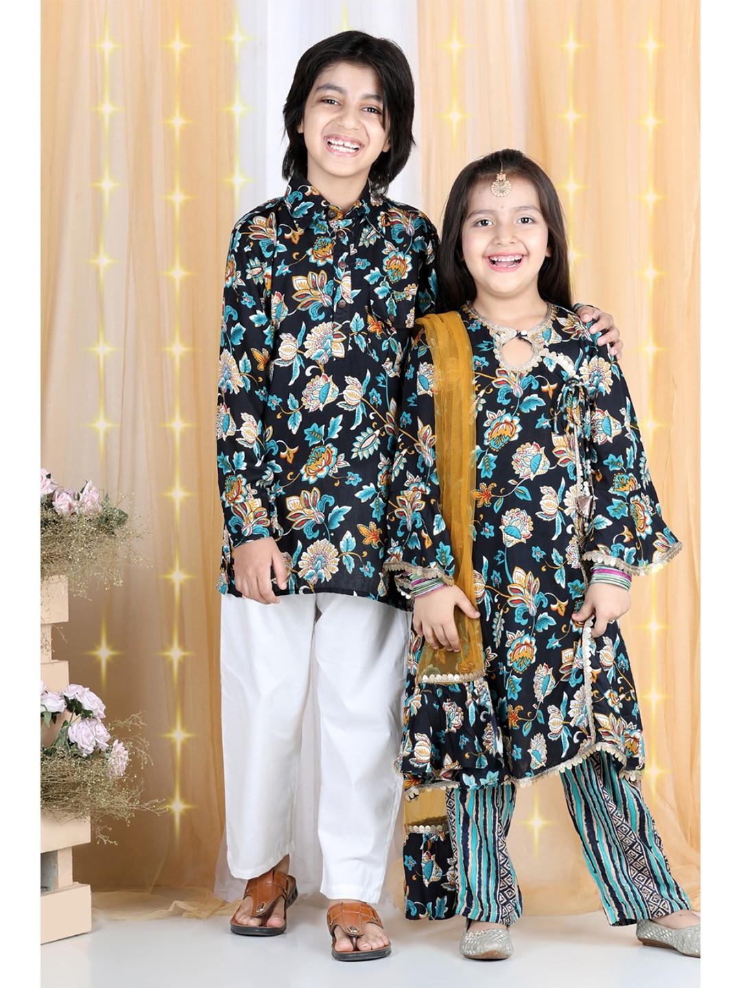 

Cutiekins Girls Teal Blue Floral Printed Angrakha Kurta with Palazzos & With Dupatta
