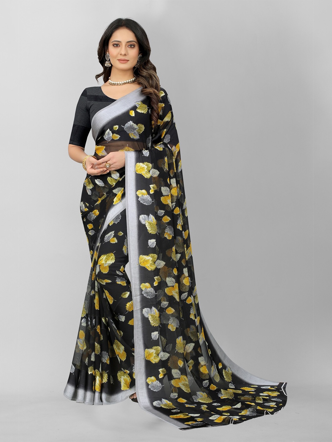 

APNISHA Black & Grey Floral Zari Pure Georgette Saree
