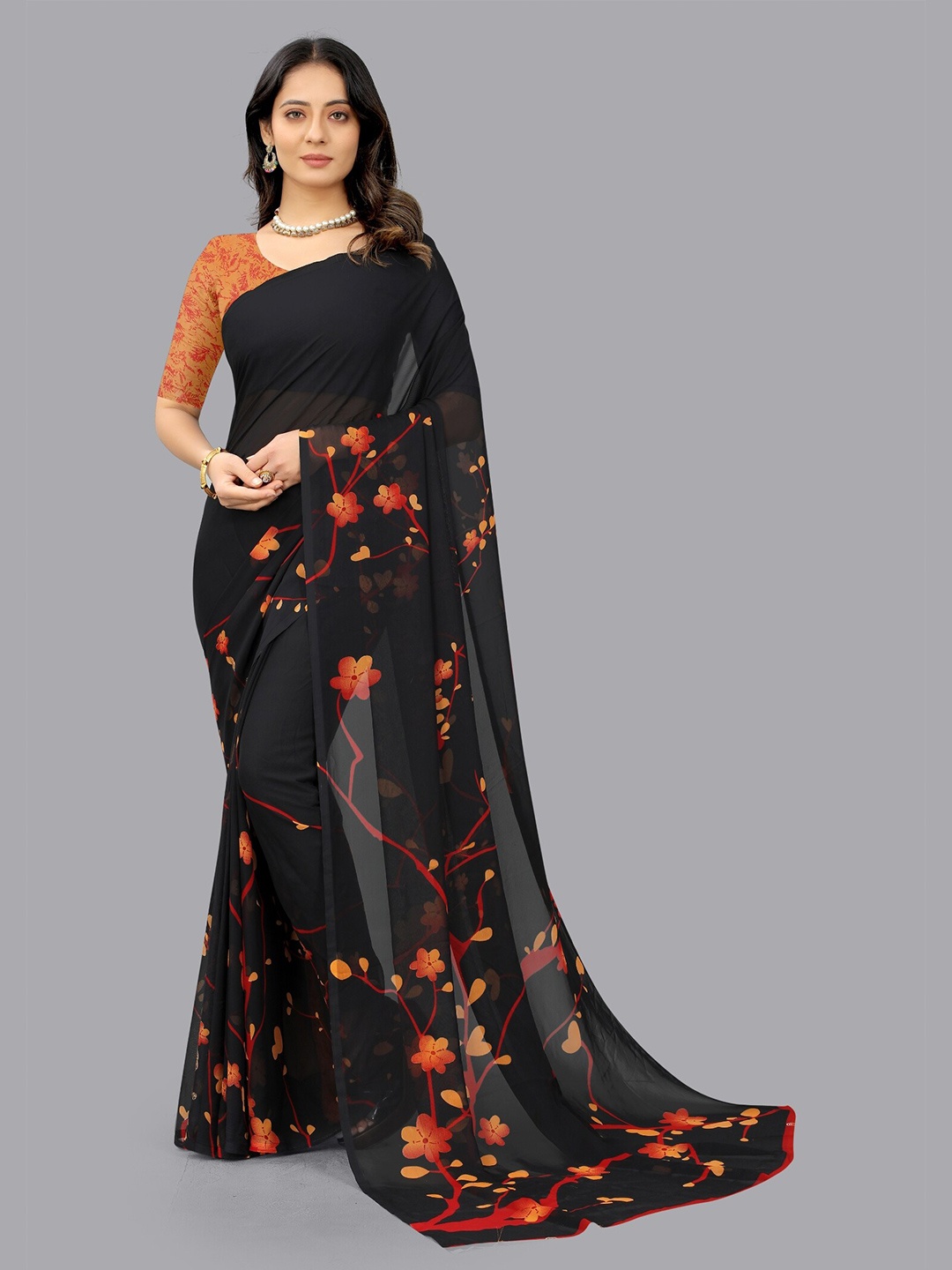

APNISHA Black & Orange Floral Pure Georgette Saree