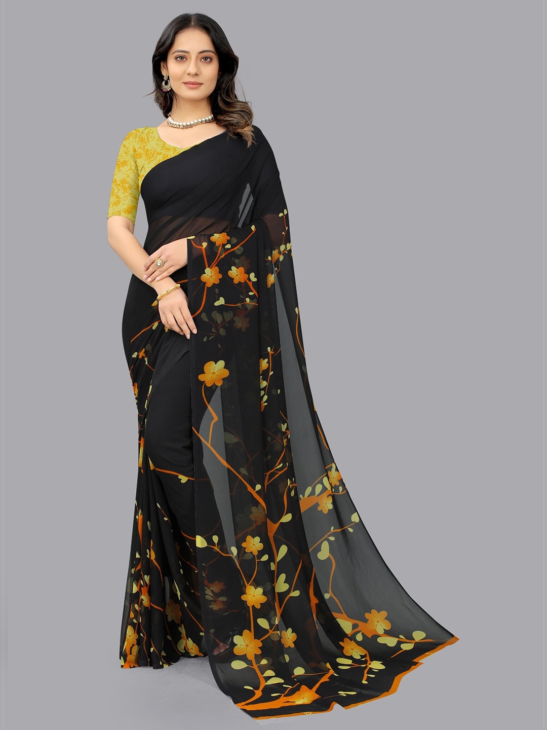 

APNISHA Black & Yellow Floral Pure Georgette Saree