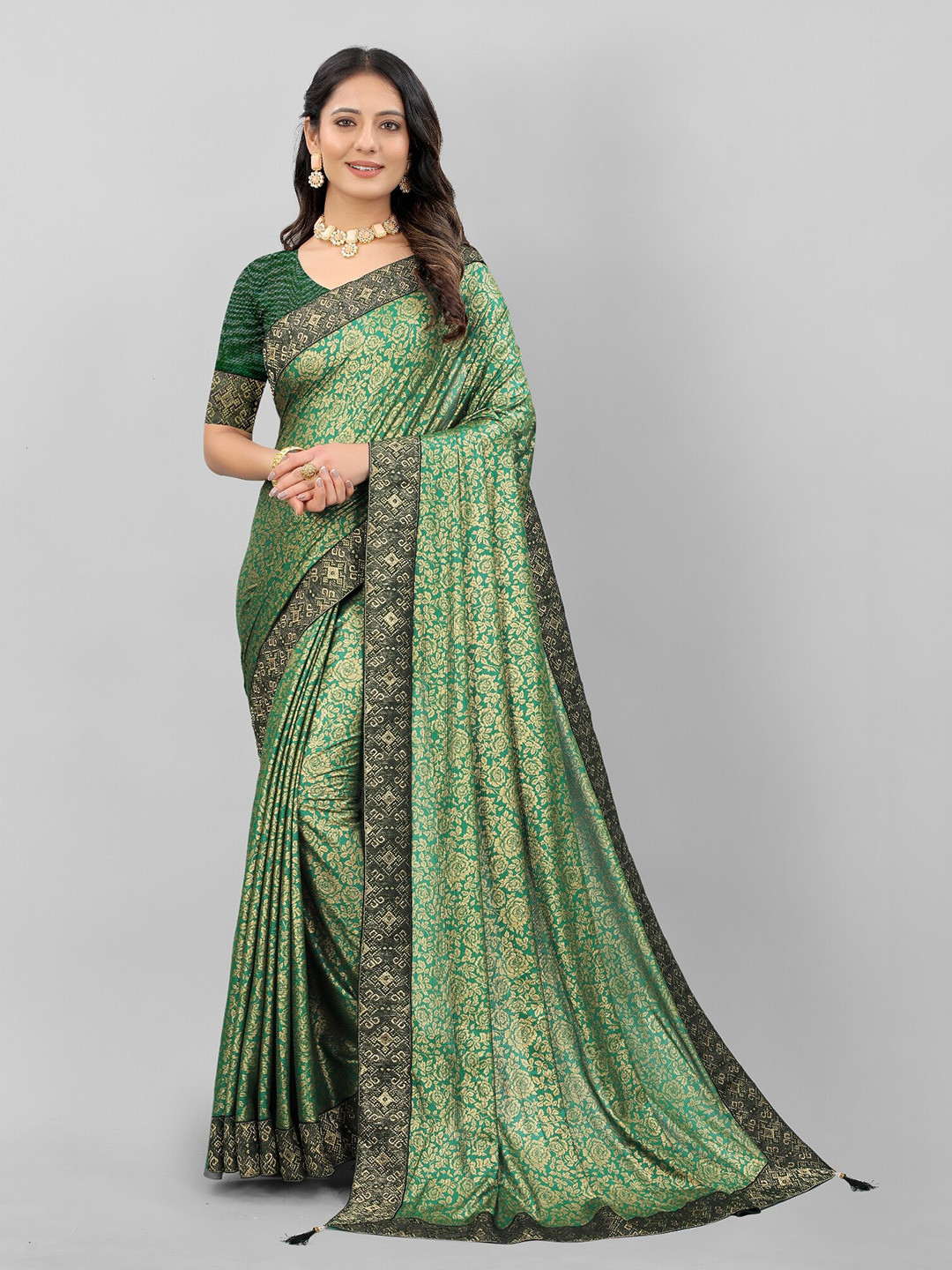 

APNISHA Green & Black Floral Zari Saree