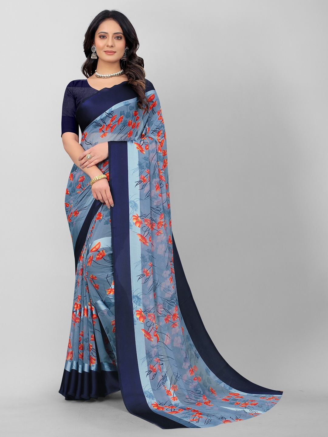 

APNISHA Blue & Orange Floral Pure Georgette Saree
