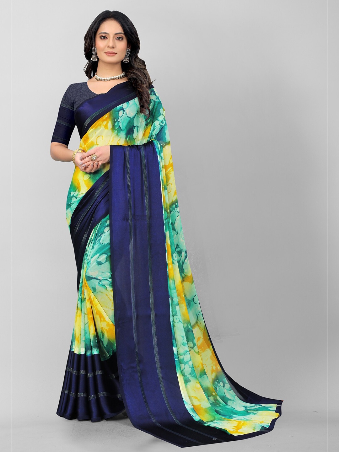 

APNISHA Navy Blue & Green Floral Pure Georgette Saree