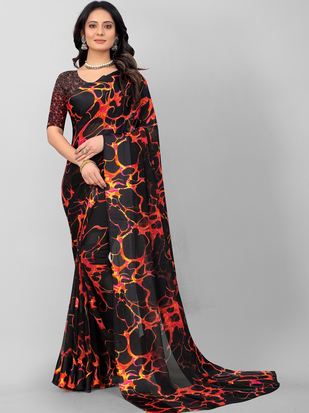 

APNISHA Black & Orange Floral Pure Georgette Saree