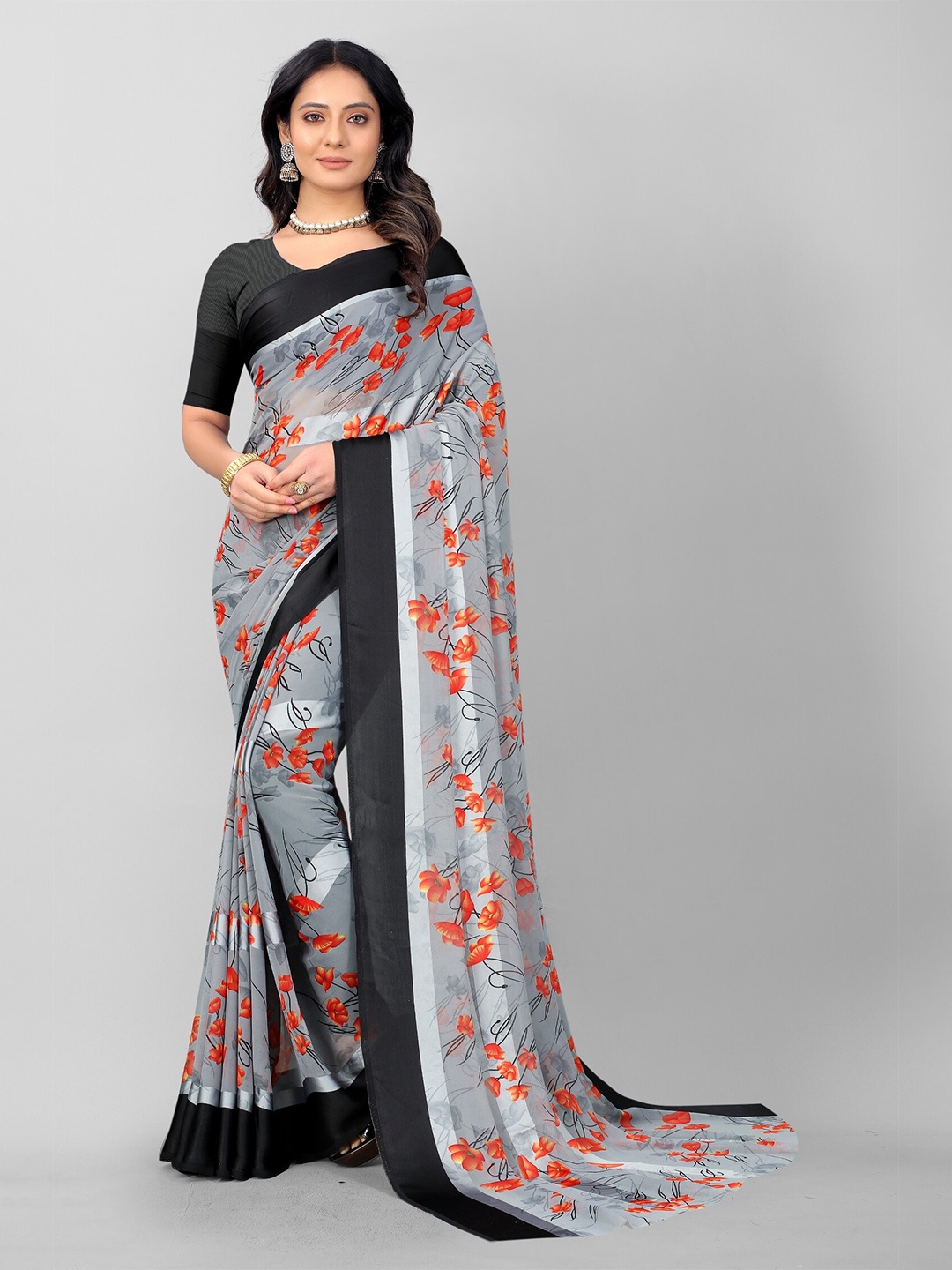 

APNISHA Grey & Orange Floral Pure Georgette Saree