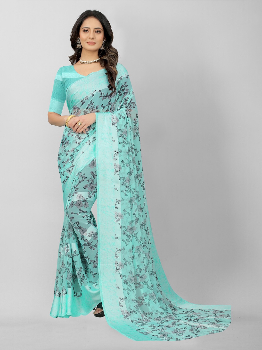

APNISHA Teal & Grey Floral Pure Georgette Saree