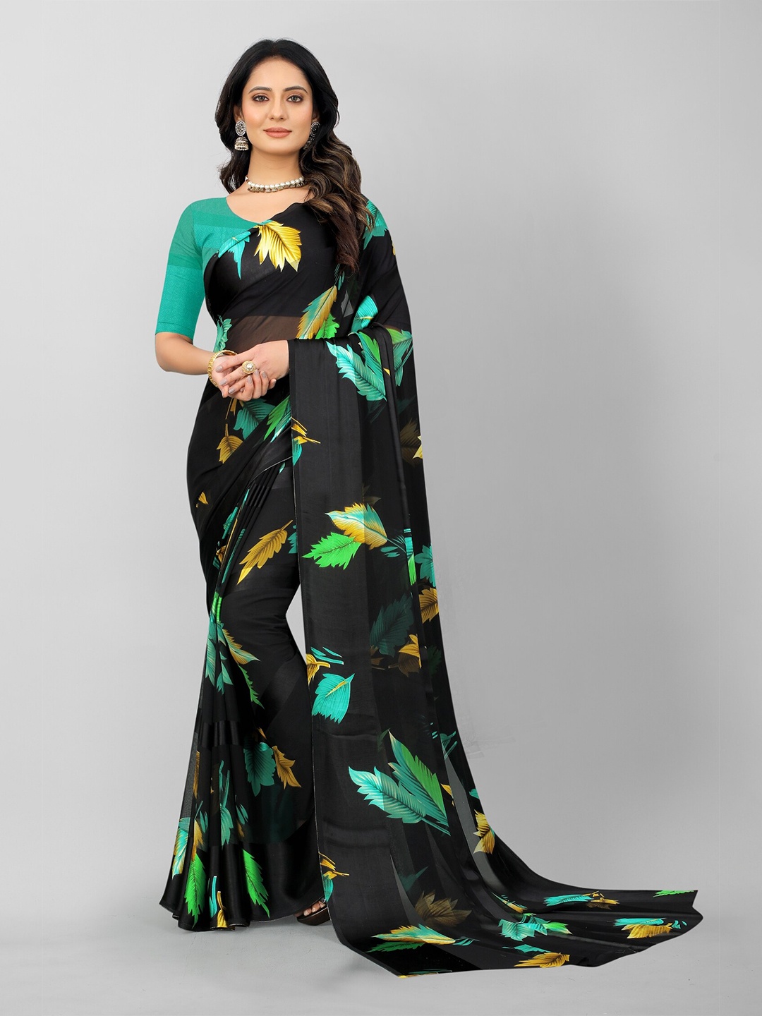 

APNISHA Teal & Black Floral Pure Georgette Saree