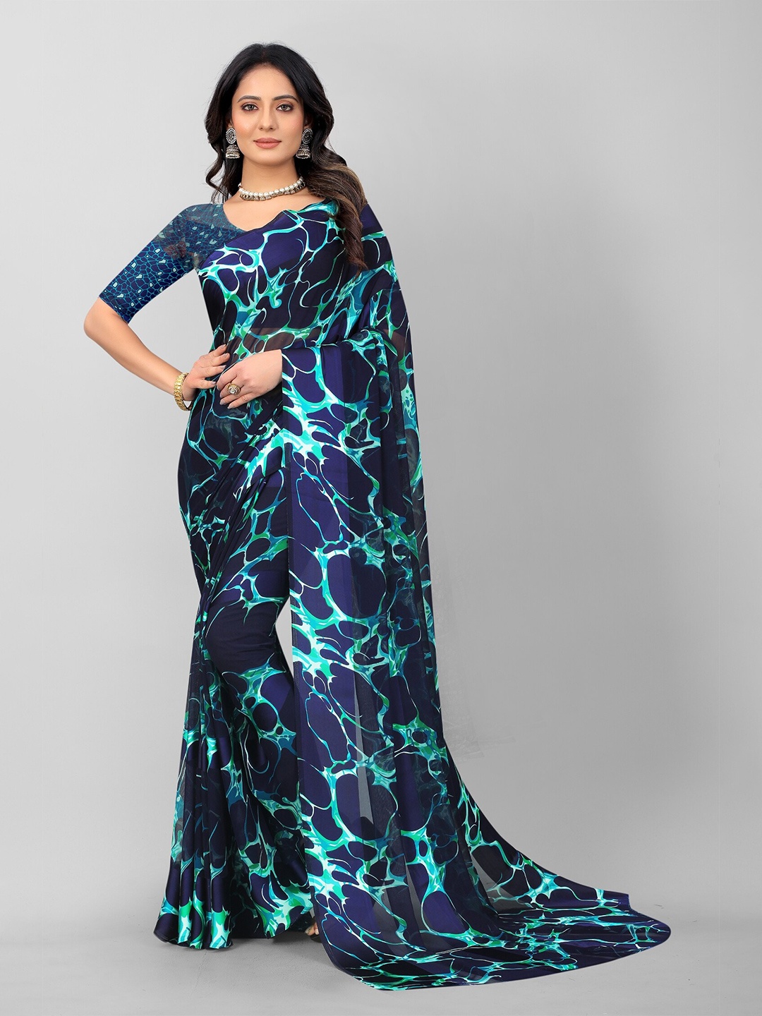 

APNISHA Blue & Green Pure Georgette Saree