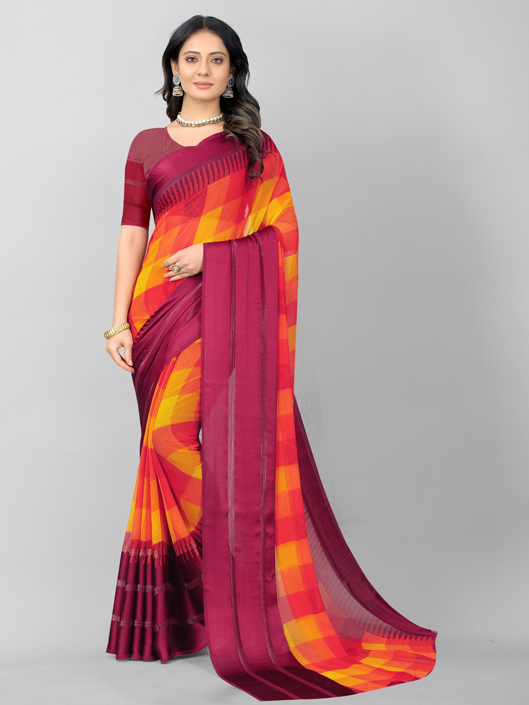 

APNISHA Orange & Purple Checked Pure Georgette Saree