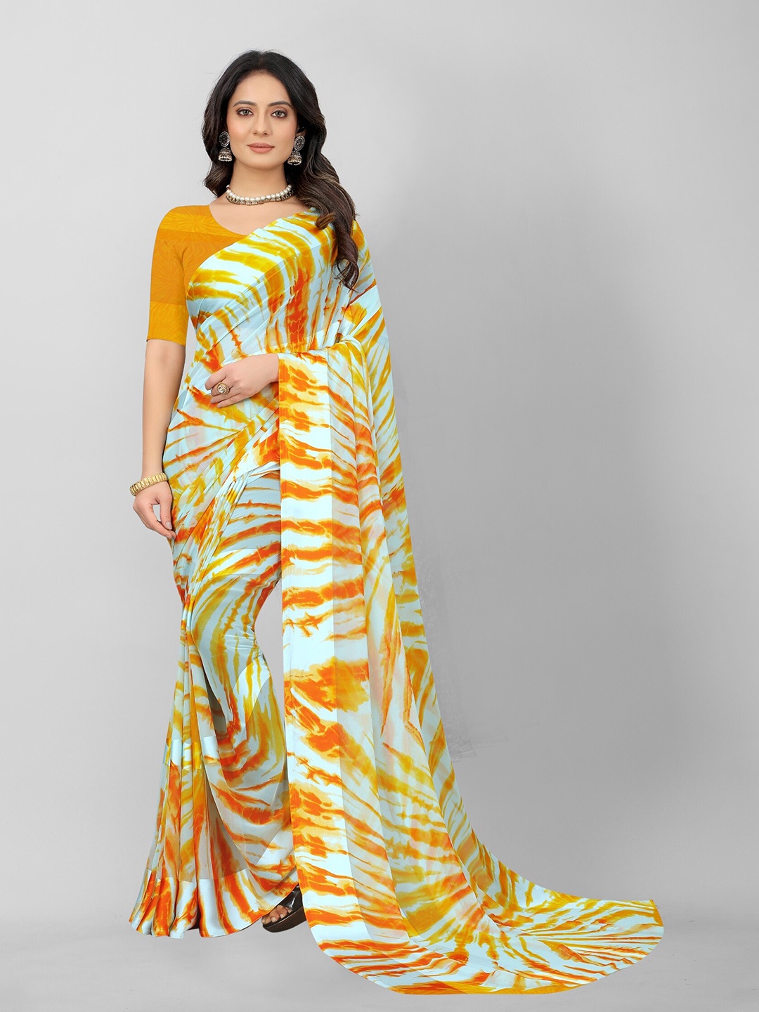 

APNISHA Yellow & Blue Pure Georgette Saree