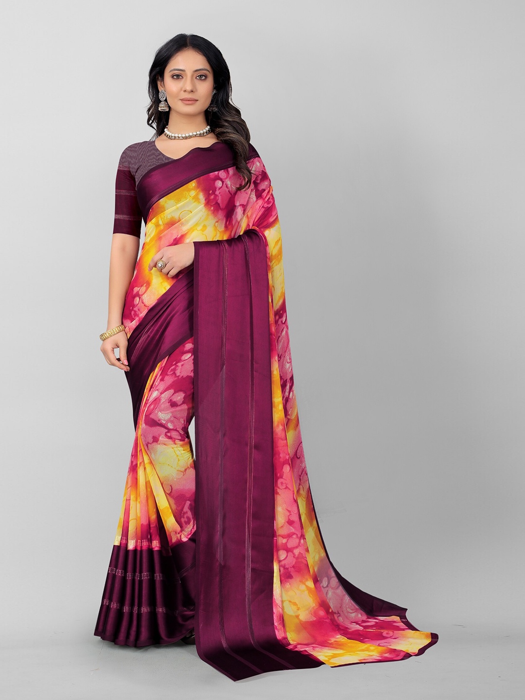 

APNISHA Purple & Yellow Pure Georgette Saree