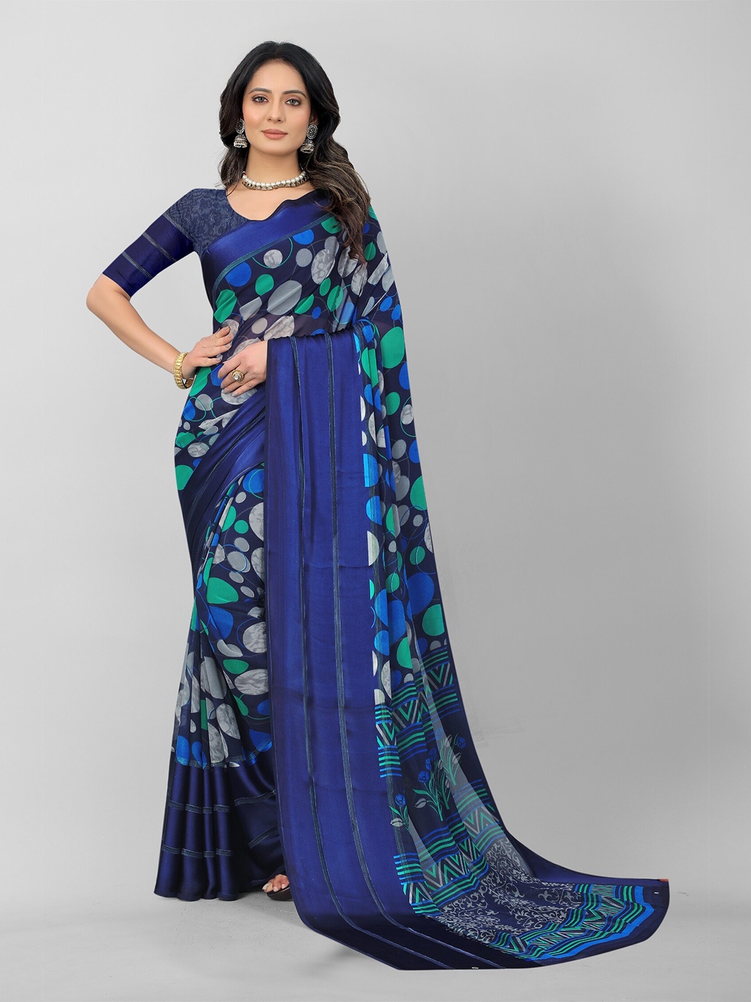 

APNISHA Blue & Green Pure Georgette Saree