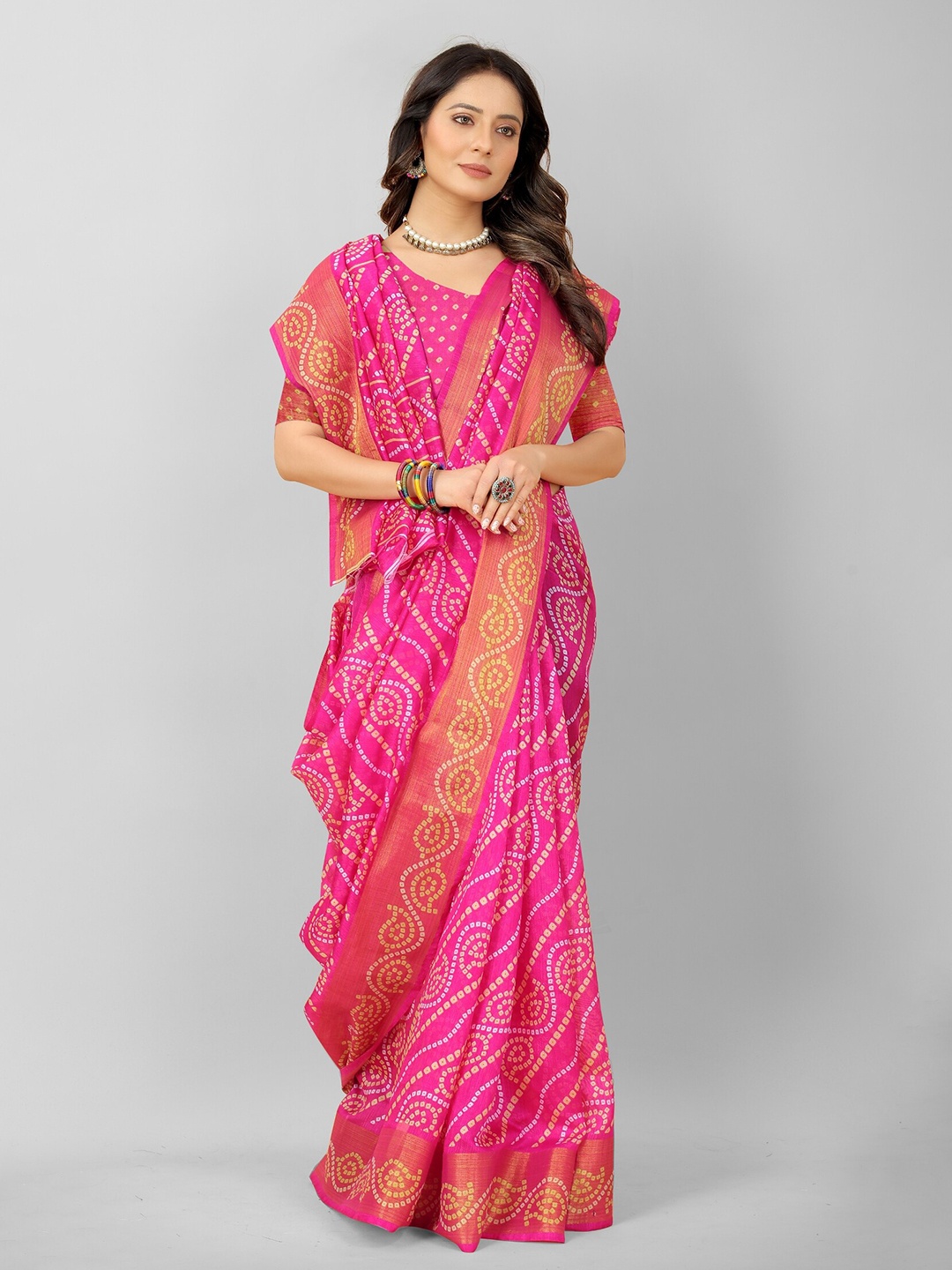 

APNISHA Pink & White Bandhani Zari Pure Cotton Saree