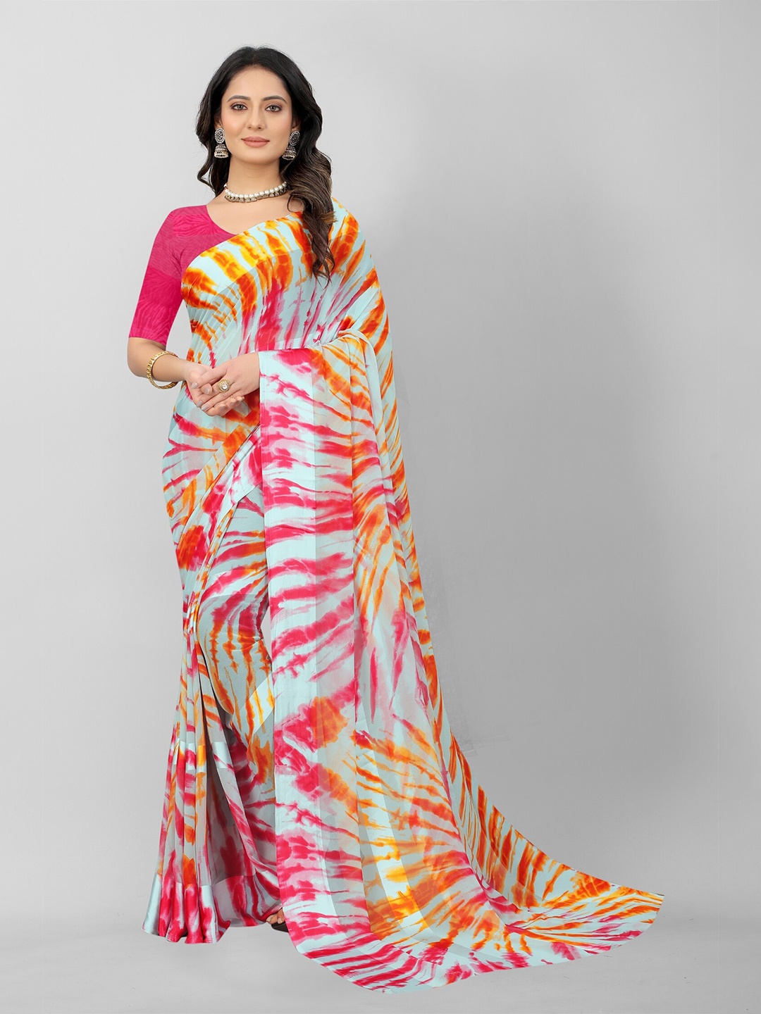 

APNISHA Red & Blue Pure Georgette Saree