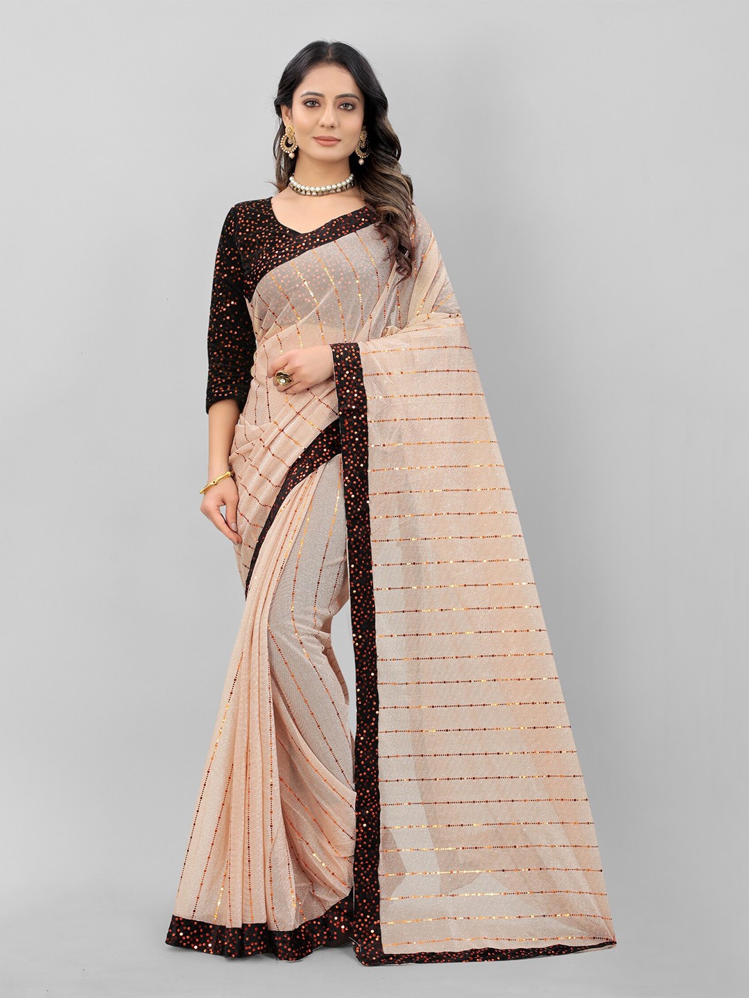 

APNISHA Beige & Brown Striped Saree