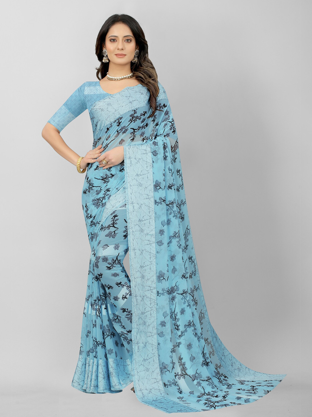 

APNISHA Blue & Black Floral Pure Georgette Saree
