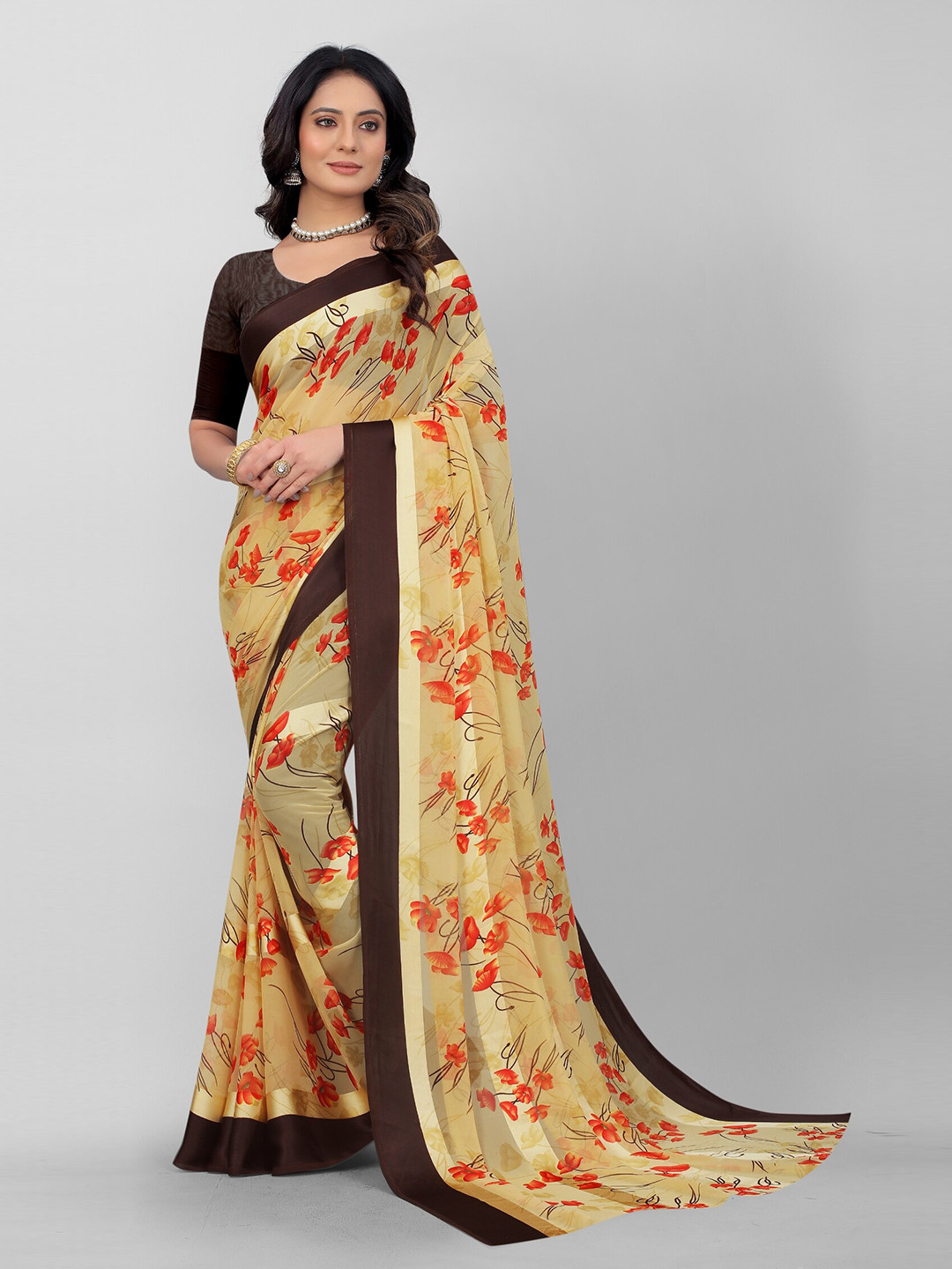 

APNISHA Yellow & Orange Floral Pure Georgette Saree