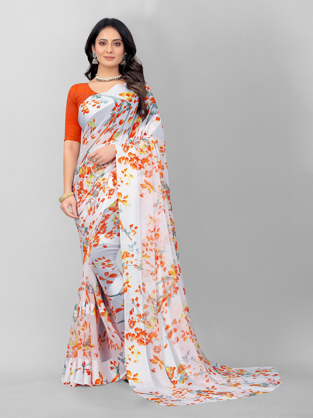 

APNISHA Orange & White Floral Pure Georgette Saree