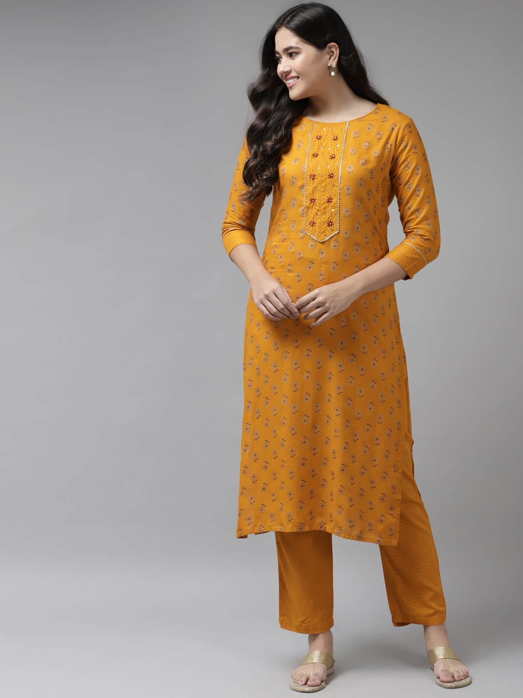 

Yufta Women Mustard Yellow Ethnic Motifs Yoke Design Beads and Stones Kurta with Trousers