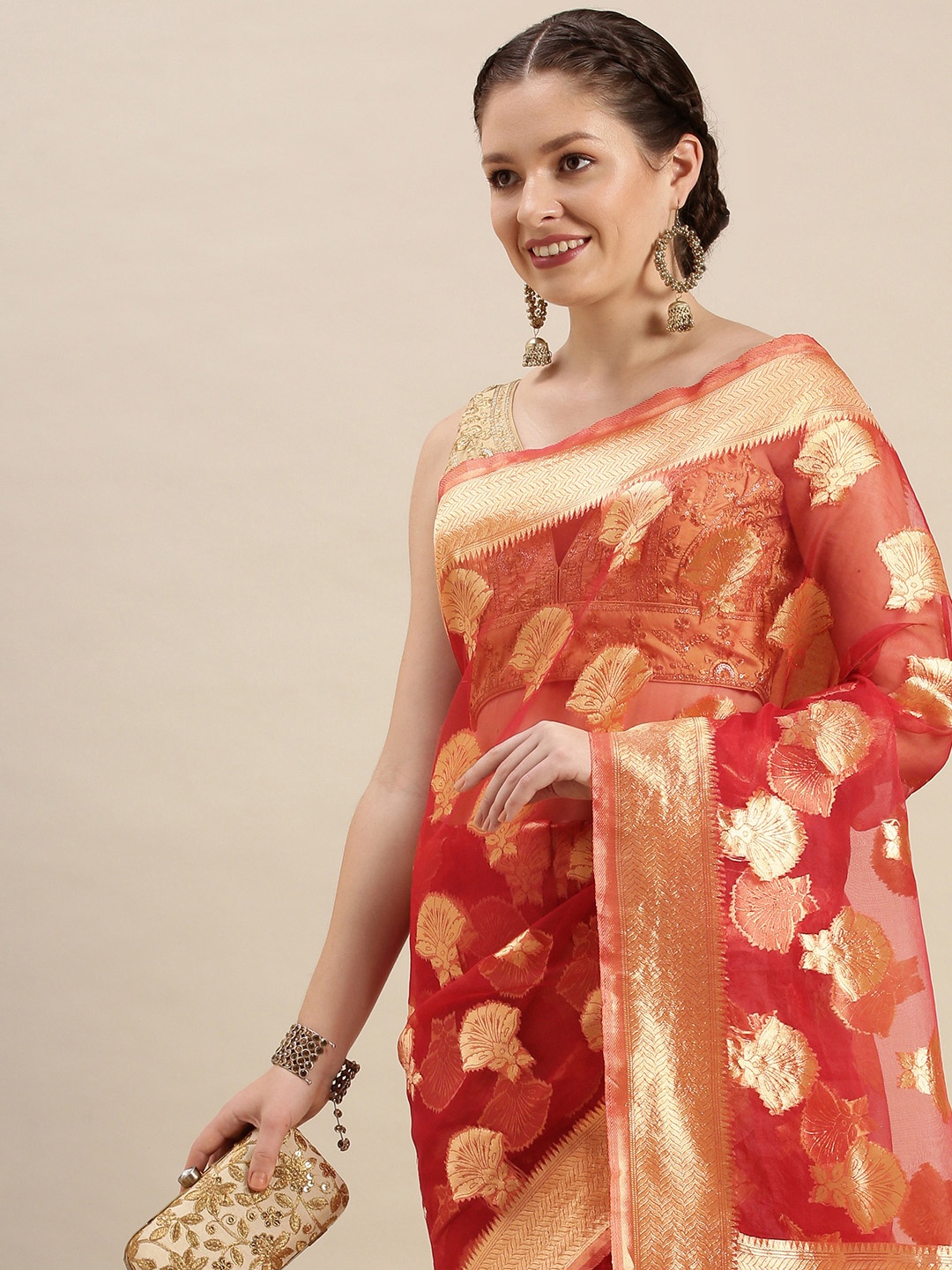 

Rivana Rust Red & Gold Floral Zari Organza Celebrity Banarasi Saree