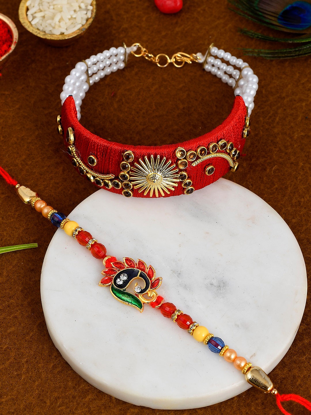 

Shoshaa Set of 2 Red & Multi Color Lumba Bracelet Peacock Bhai Bhabhi Rakhis