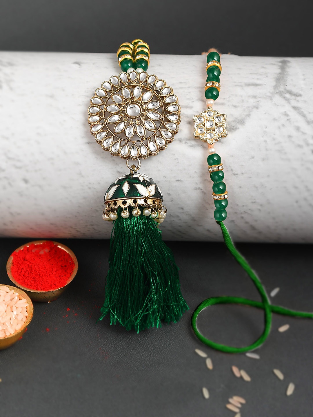 

Shoshaa Set of 2 Green & White Kundan & Pearl Beaded Rakhi & Lumba with Roli Chawal
