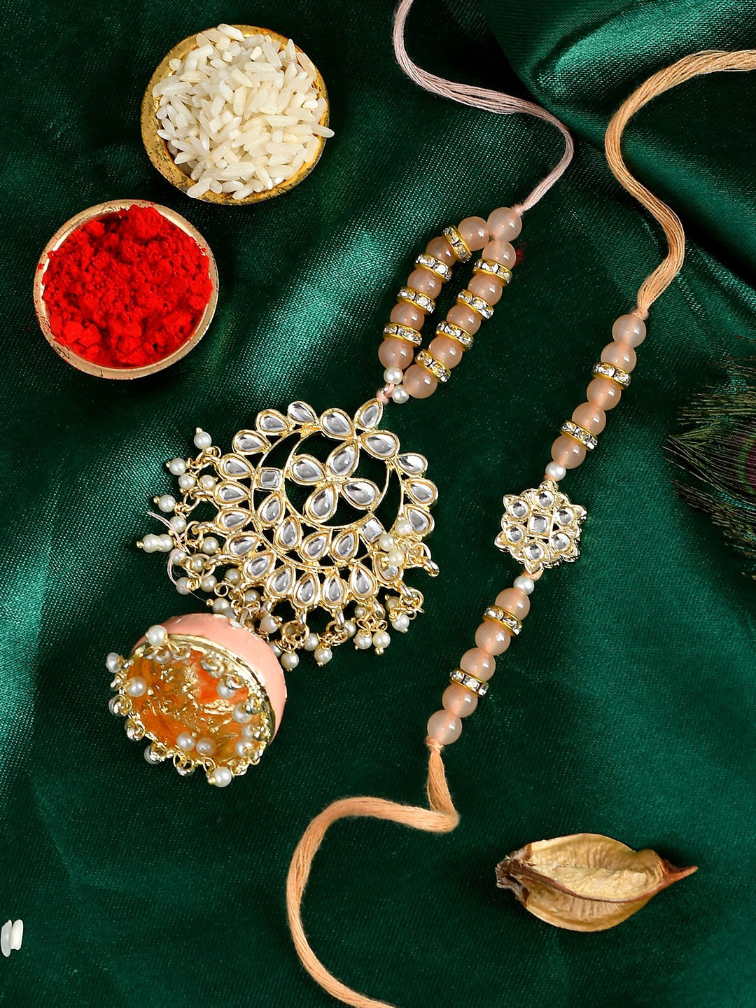 

Shoshaa Peach Kundan & Pearl Beaded Rakhi Set