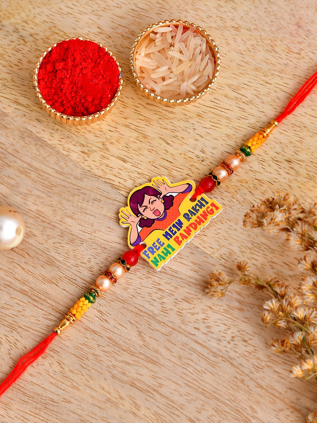 

Shoshaa girl Multicolor Gold Beaded Slogan Rakhi