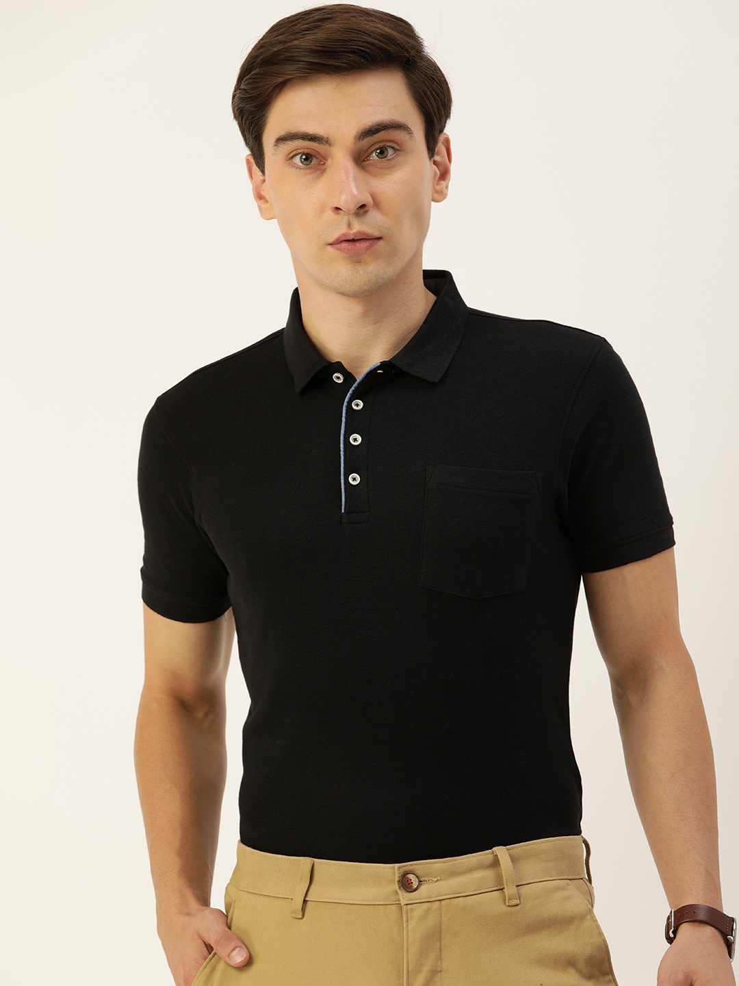 

Peter England Men Black Solid Pure Cotton Polo Collar T-shirt