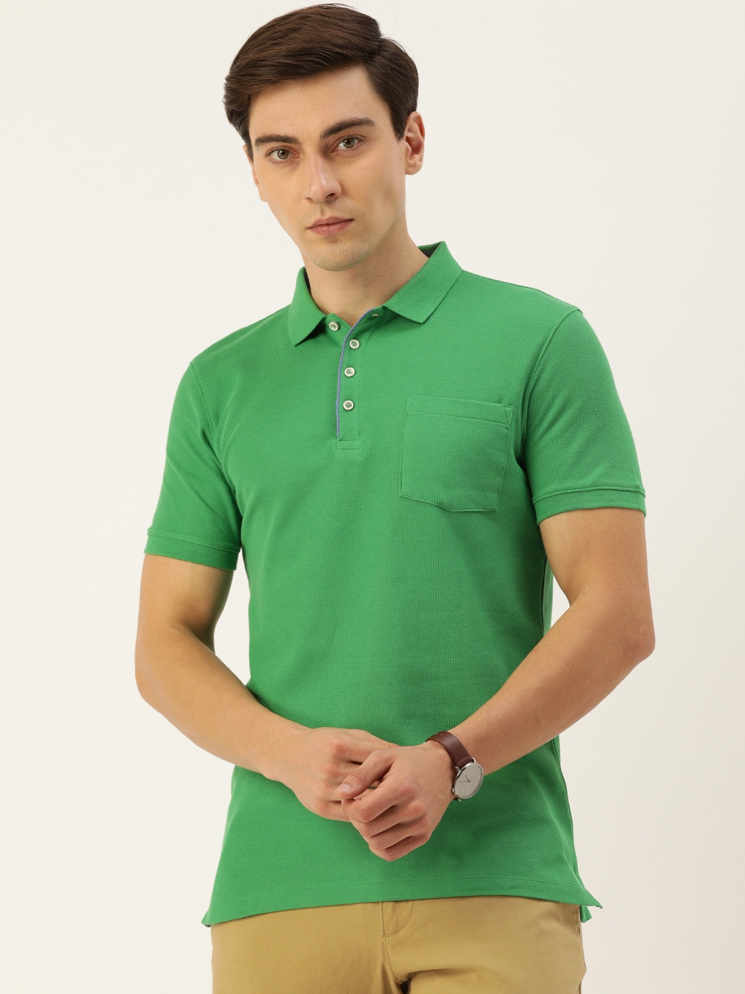 

Peter England Men Green Solid Pure Cotton Polo Collar T-shirt