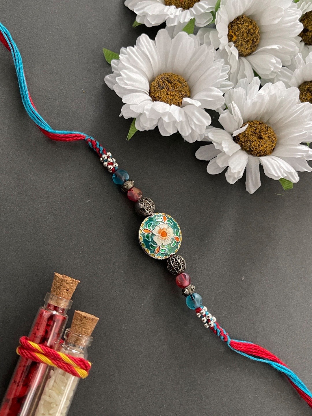 

Digital Dress Room Men Red & Blue Floral Rakhi