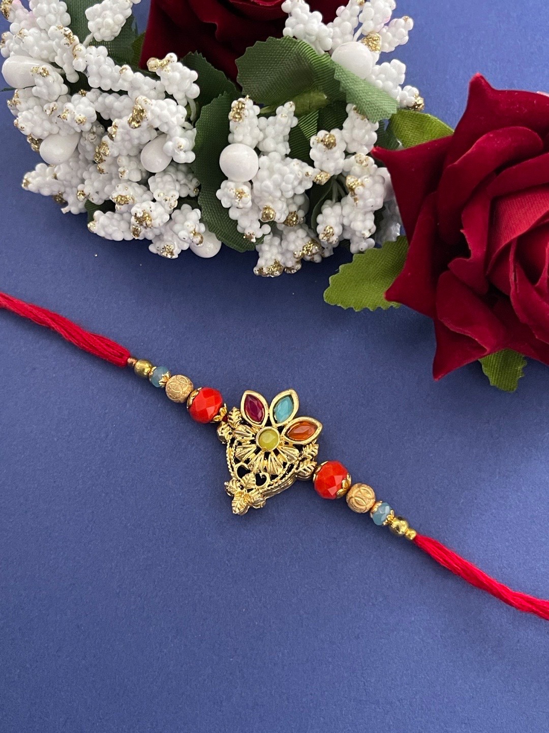 

Digital Dress Room Men Red & Gold-Toned Stone-Studded Rakhi