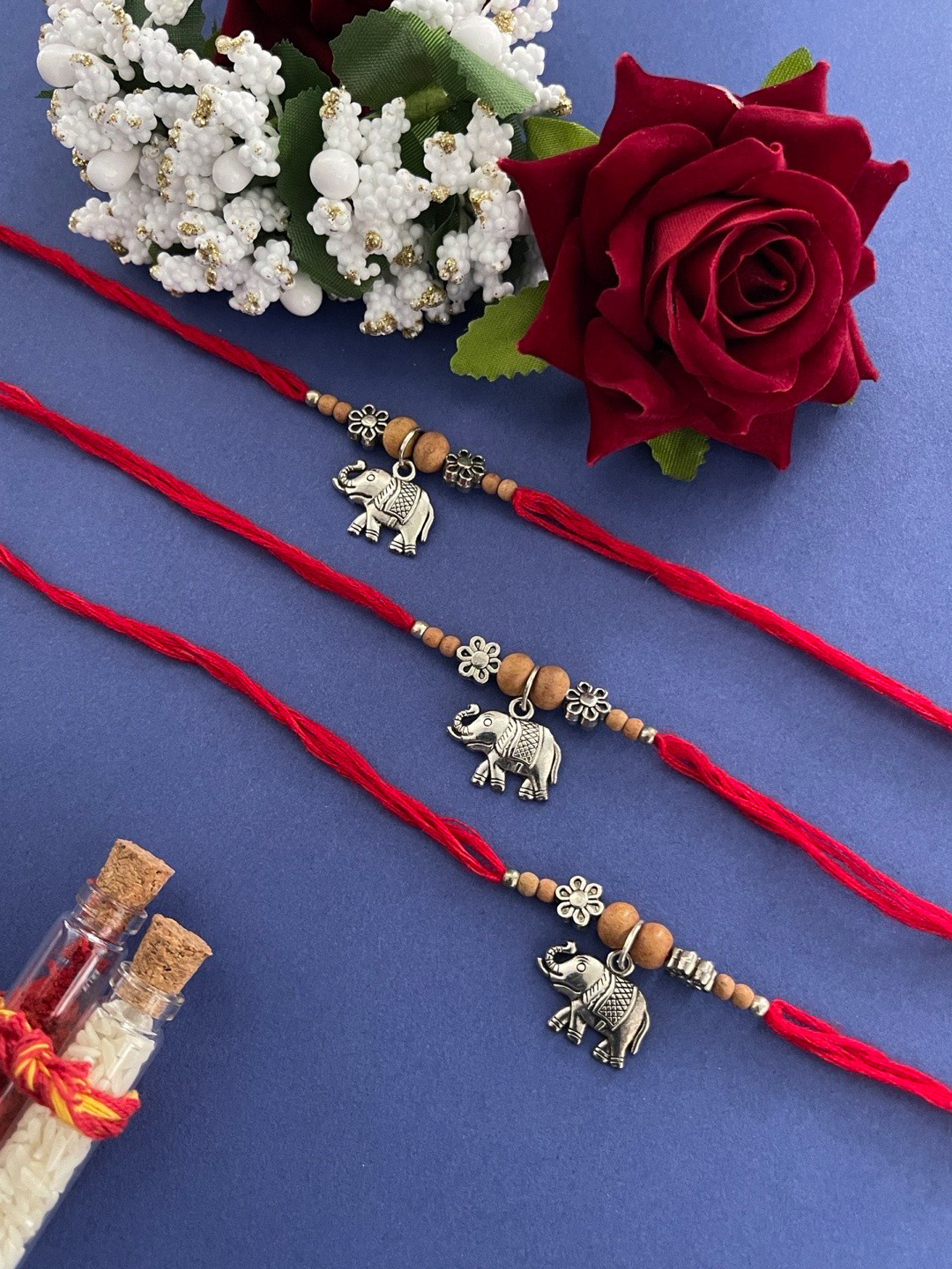 

Digital Dress Room Men Set Of 2 Silver-Plated & Red Rakhis