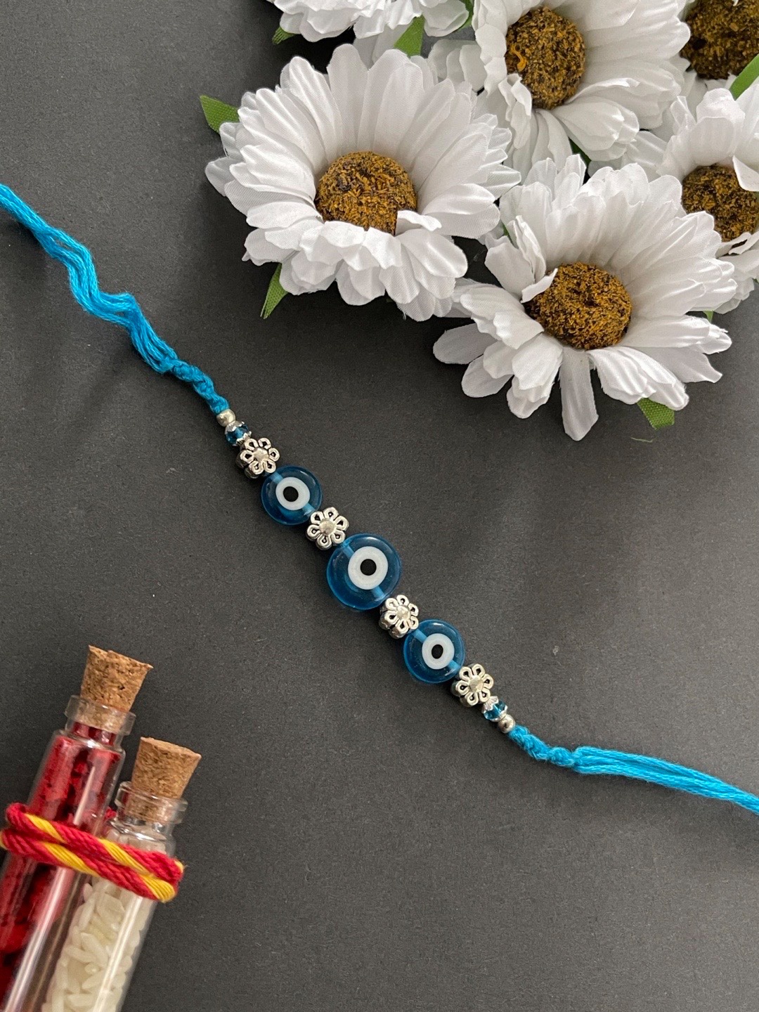 

Digital Dress Room Blue Evil Eye Rakhi