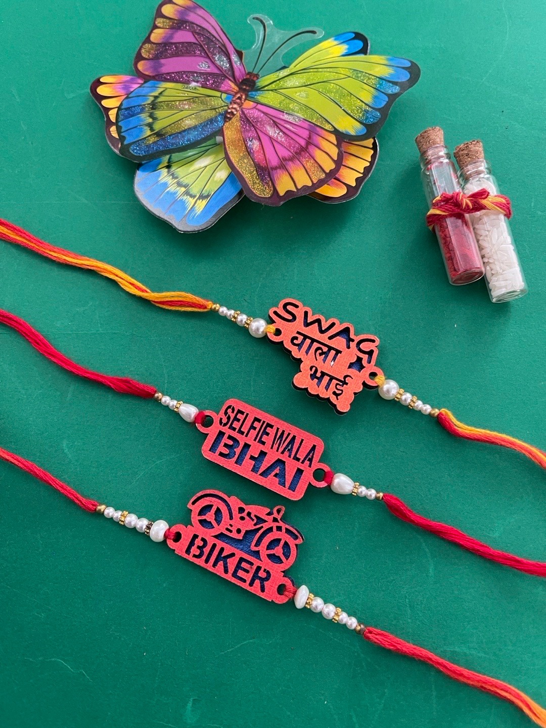 

Digital Dress Room Set Of 3 Red Rakhi With Roli Chawal