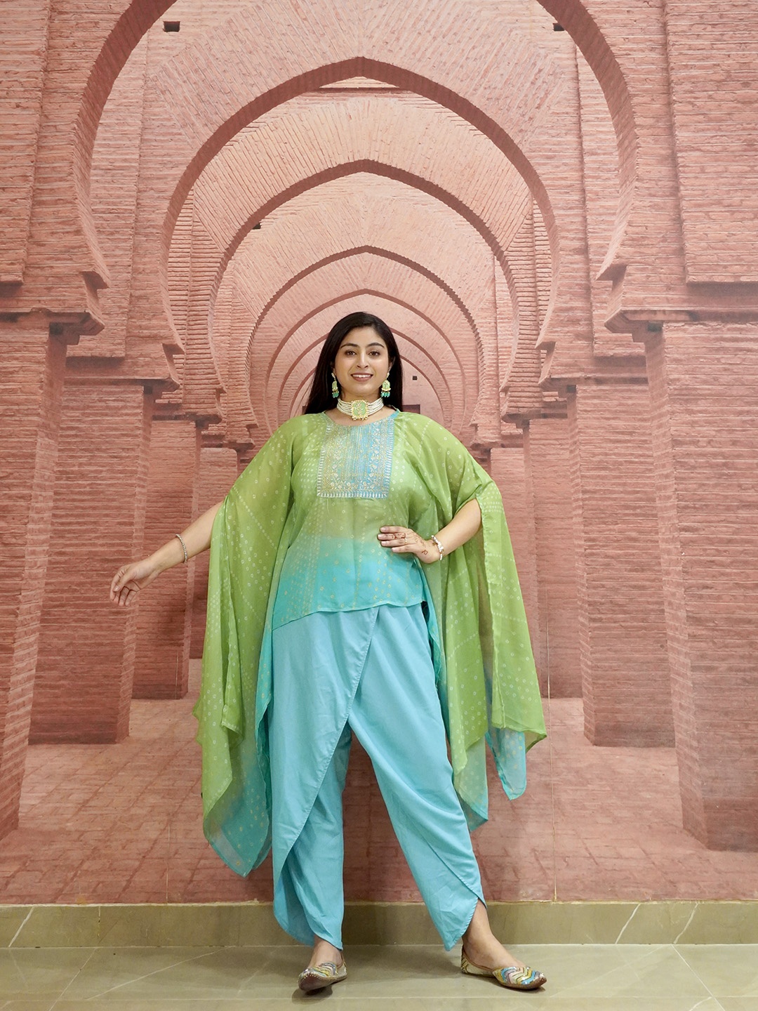 

Vishudh Women Turquoise Blue Layered Kurti with Dhoti pant