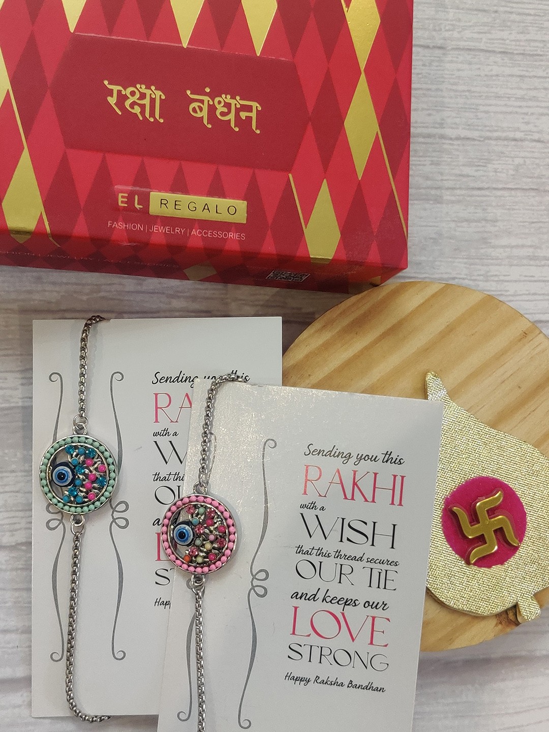 

EL REGALO Bhaiya Bhabhi Red Silver-Toned 2 Beaded Wraparound Rakhi Greeting Card Set