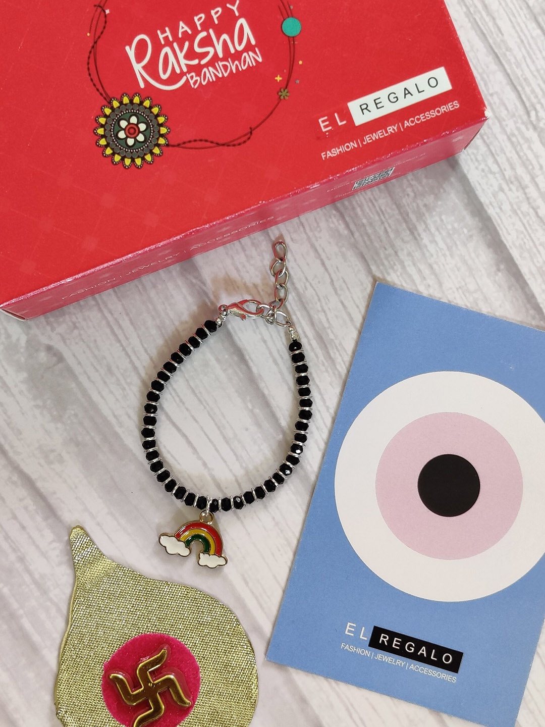 

EL REGALO Kids Blue Nazaria Rakhi Combo with Greeting Card & Roli Chawal Shagun
