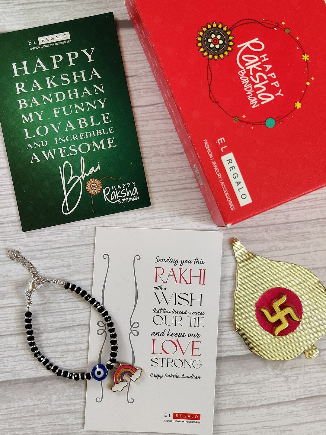

EL REGALO Kids Baby Nazaria Evil Eye Rakhi Combo with Roli Chawal Shagun, Red