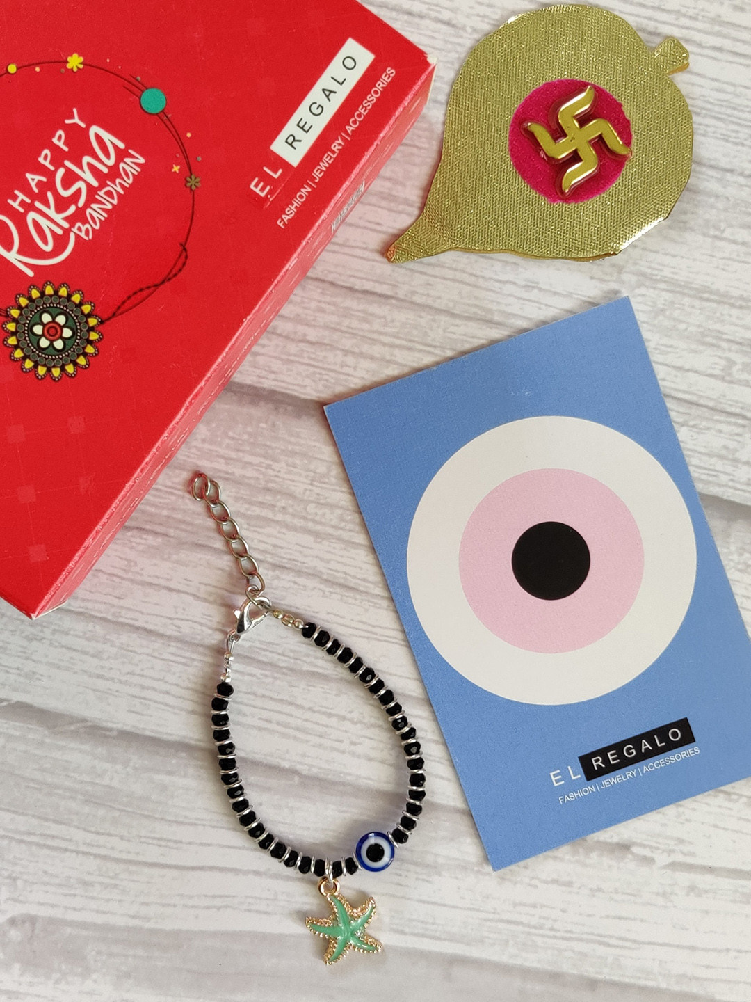 

EL REGALO Kids Green Nazaria Rakhi Combo with Greeting Card & Roli Chawal Shagun