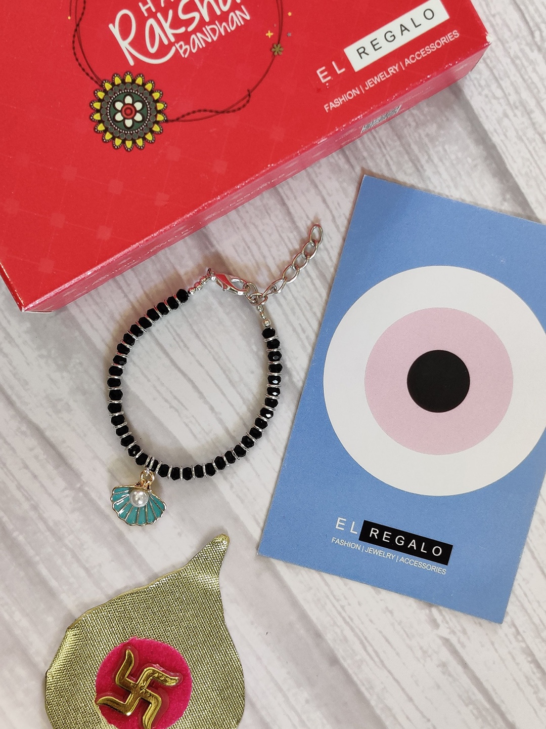 

EL REGALO Kids Blue Nazaria Rakhi Combo with Greeting Card & Roli Chawal Shagun