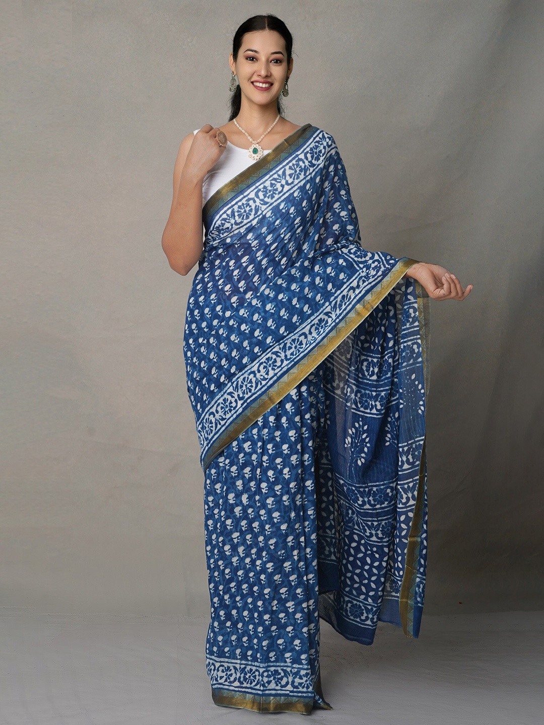 

Unnati Silks Navy Blue & White Ethnic Motifs Zari Pure Cotton Block Print Saree