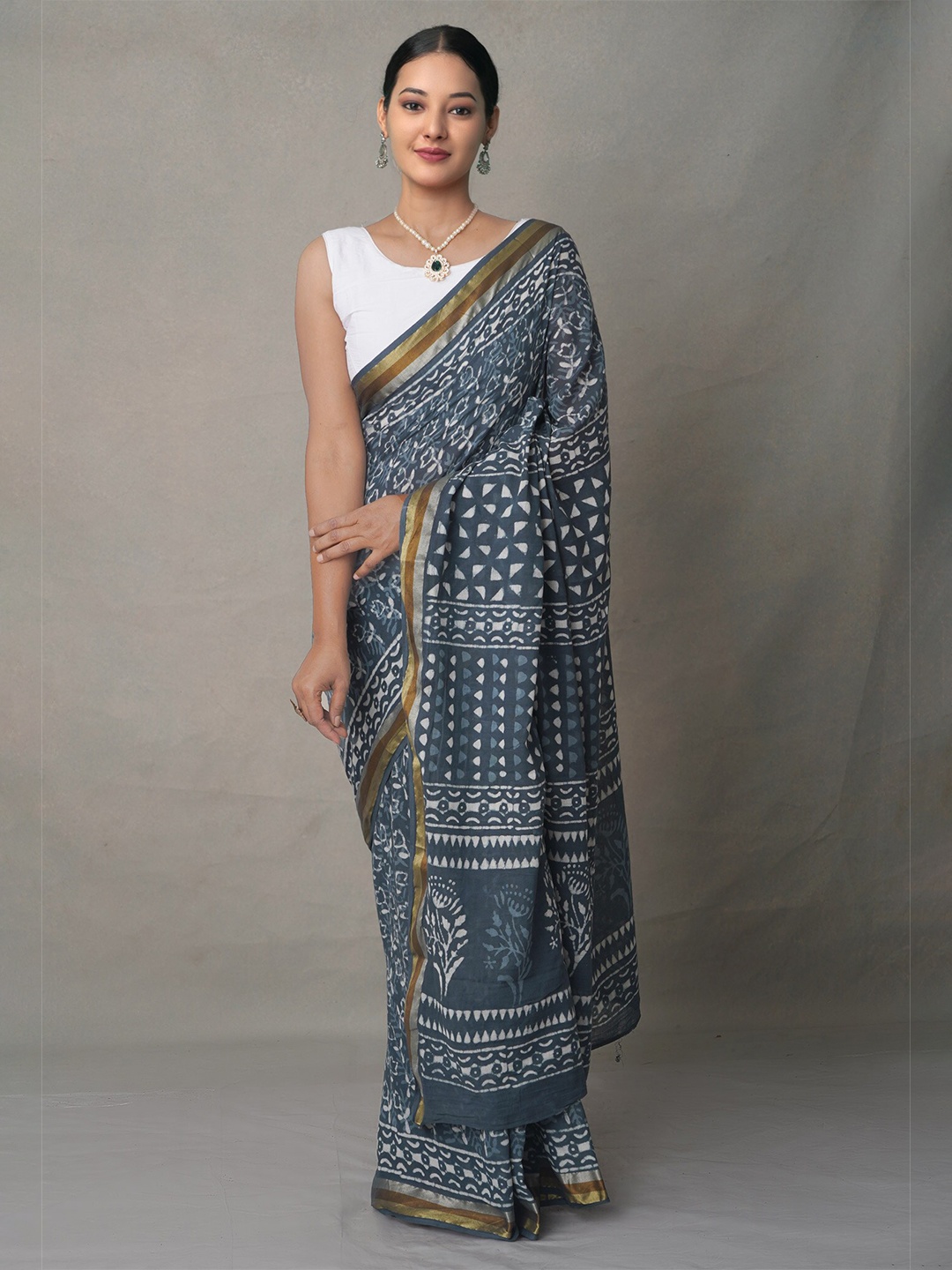 

Unnati Silks Teal & White Ethnic Motifs Zari Pure Cotton Block Print Saree