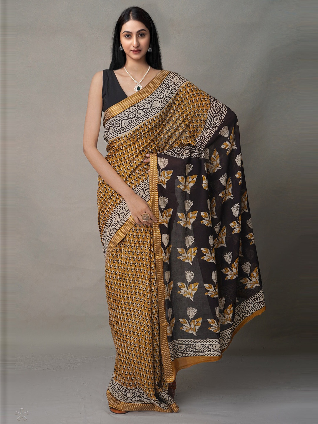 

Unnati Silks Yellow & Black Floral Pure Cotton Block Print Saree